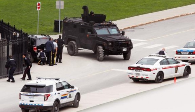 Incidente armate în Ottawa. Unul dintre autori este militant islamist / Galerie foto - download-1414046973.jpg