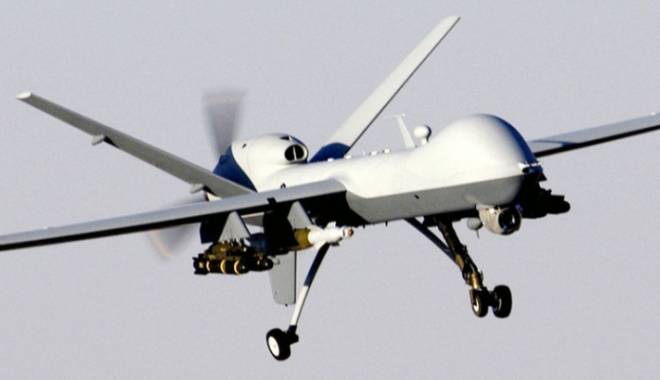 Români suspectați de spargeri în Elveția, prinși cu ajutorul unei drone - drona-1415604223.jpg