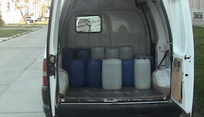 Sute de litri de alcool confiscate de Garda de Coastă - dsc02752-1396607392.jpg