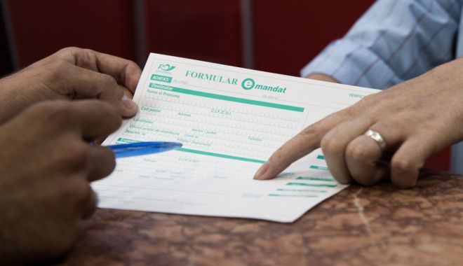 Tot mai multe persoane au apelat la transferurile de bani prin E-mandat - emandat-1590048489.jpg