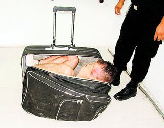 A vrut sa evadeze intr-un geamantan - evadat-1309936591.jpg