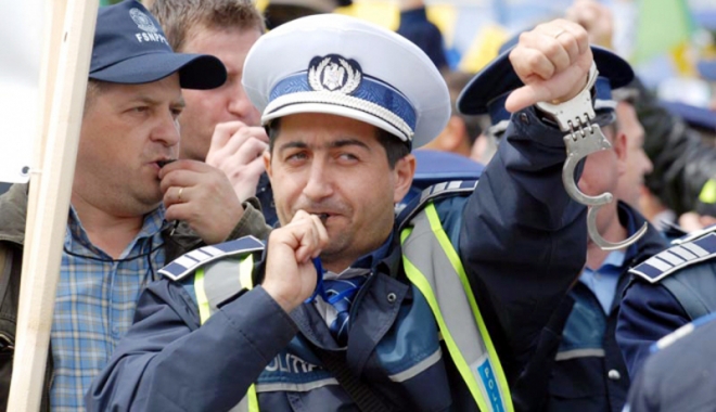 Polițiștii amenință cu proteste de stradă. 