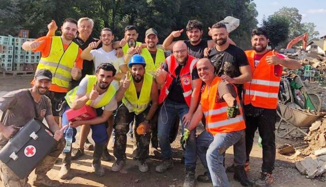 Gest de solidaritate. Refugiaţii sirieni i-au ajutat pe nemţi să cureţe în urma inundaţiilor - fondrefugiatiisirieni-1628434016.jpg