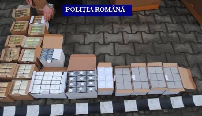Galerie foto. Captură a polițiștilor: mii de parfumuri și kilograme de bijuterii din aur aduse din Turcia - foto1-1423839062.jpg