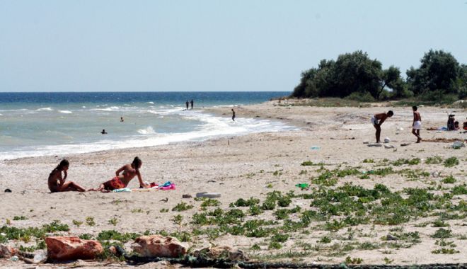 Relaxare, foșnet de valuri și nisip sfârâind, pe plajele sălbatice de pe litoral - fotofondlitoralplajesalbatice-1533053687.jpg