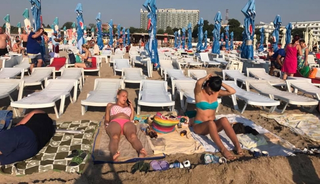IMAGINI SCANDALOASE! Turiști goniți de pe plajă de proprietarii de șezlonguri! - fotoplaja6-1503054148.jpg