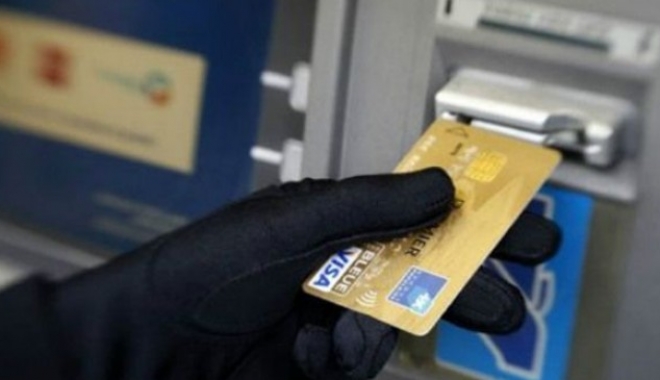 DIICOT a reținut șapte persoane specializate în falsificarea de carduri bancare - furt-1478787223.jpg