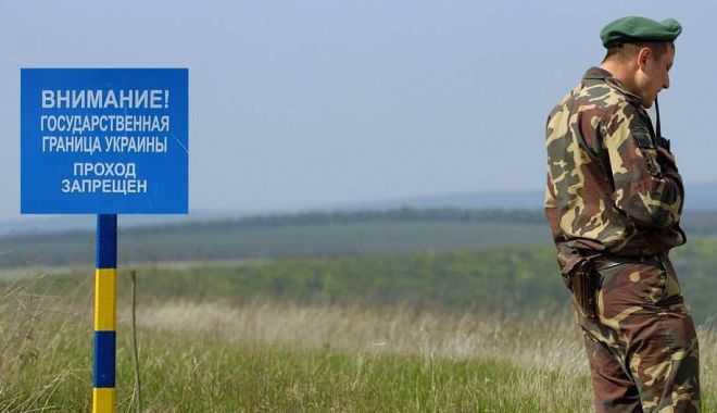 Rusia a finalizat gardul de securitate la granița dintre Crimeea și Ucraina - gard-1546008449.jpg