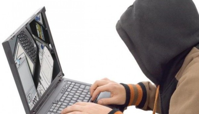 1.000 de CD-uri cu materiale pornografice cu minori, găsite în locuința unui bărbat - hackeri1600x463-1363952033.jpg