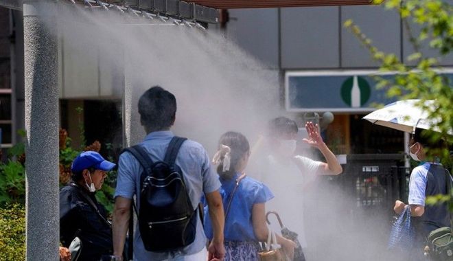 Omenirea trebuie să se pregătească pentru valuri mai intense de caniculă, avertizează ONU - heatwavejapan20230718182715-1689686112.jpg