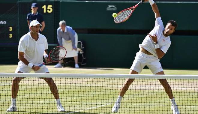 Veste bună din tenis. Perechea Tecău / Rojer, pe primul loc în clasamentul pentru Turneul Campionilor - horiatecaujeanjulienrojerwimbled-1436790924.jpg