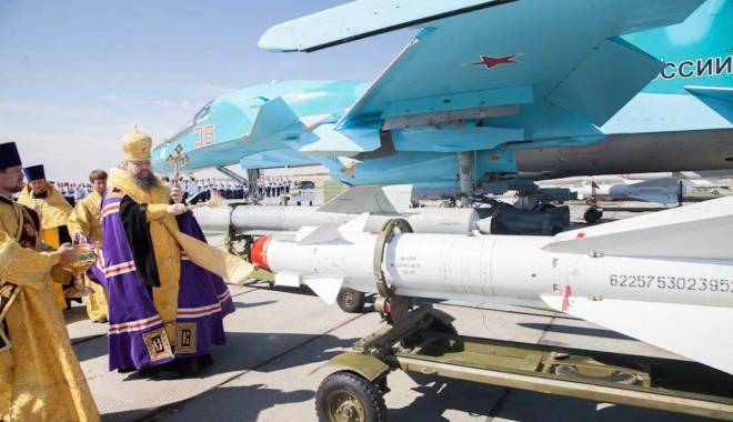 Rusia sfințește rachetele care bombardează țintele ISIS din Siria - image-1445444381.jpg