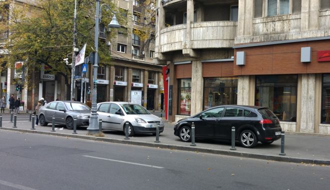 Șoferi, vești proaste! Încă un pas pentru ca mașinile parcate pe trotuare să fie ridicate! - image20151118206017160masiniparc-1575984572.jpg