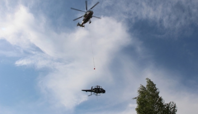 Un elicopter lovește o linie electrică, doi morți - img443745059300-1473058642.jpg
