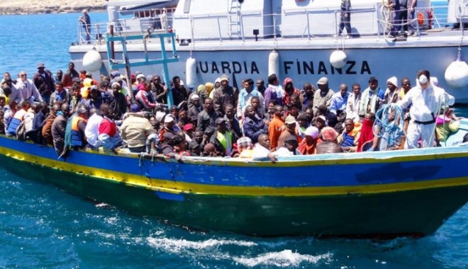Aproximativ 2.000 de imigranți, salvați în largul Libiei - imigranti-1465541055.jpg