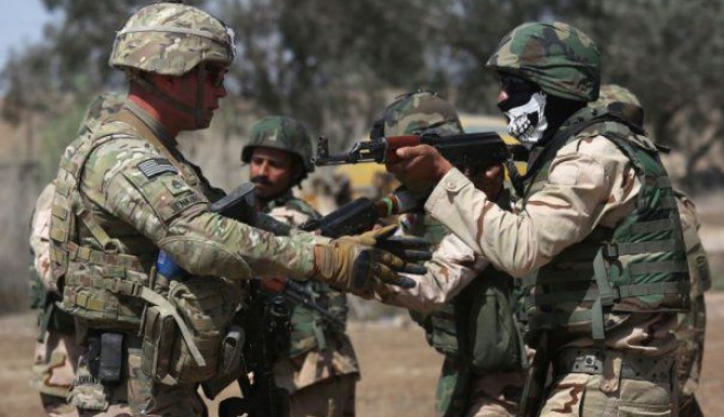 ZECI DE EXECUȚII! Militarii antrenați de forțele americane au dat lovitura - irak465x390-1501170369.jpg