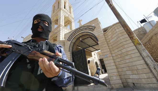 Instigare la CRIMĂ! STATUL ISLAMIC le cere MUSULMANILOR SĂ UCIDĂ FRANCEZI sau AMERICANI - iraqmosulshrine23009700-1411379402.jpg