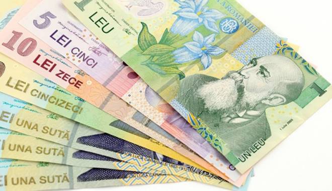 Leul pierde la euro și dolar, dar oprește creșterea francului elvețian - leul-1434469716.jpg