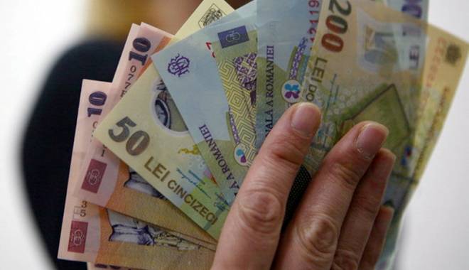 Leul, îngenuncheat de dolar și francul elvețian - leul-1443710894.jpg