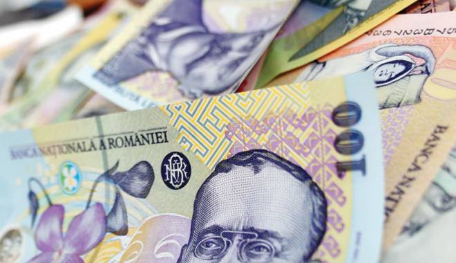 Leul a pierdut la euro și francul elvețian, dar a câștigat la dolar - leul-1449599921.jpg