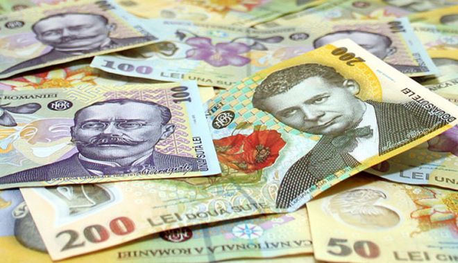 Leul pierde la euro și francul elvețian, dar câștigă la dolar - leul-1518181738.jpg