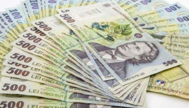 Leul câștigă la dolar și francul elvețian, dar pierde la dolar - leul-1531233161.jpg