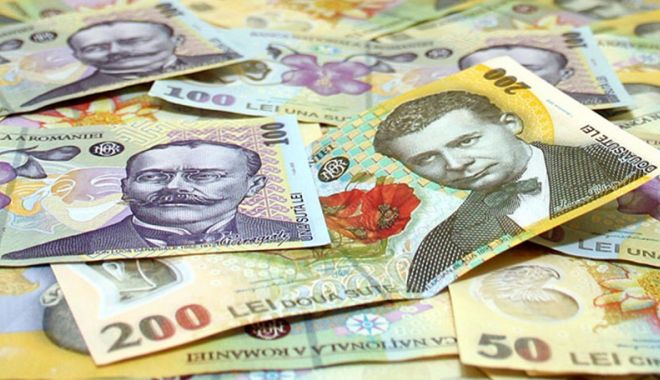 Leul pierde la dolar și francul elvețian, dar câștigă la euro - leul-1533218448.jpg
