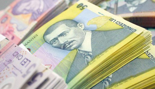 Leul pierde la euro, dar câștigă la dolar și francul elvețian - leul-1537981266.jpg