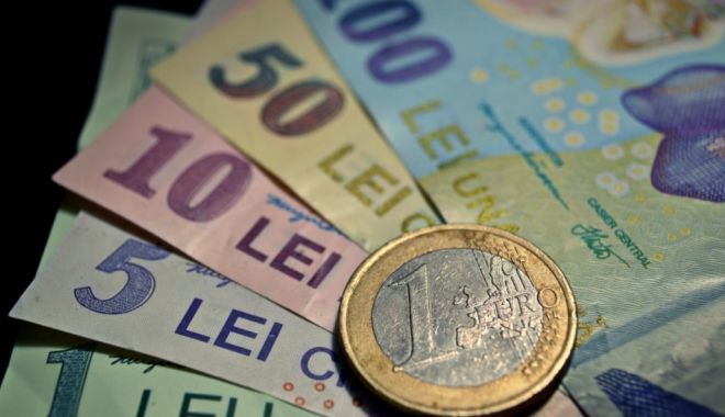 Leul mușcă adânc din dolar și francul elvețian, dar e pișcat de euro - leul-1591379608.jpg