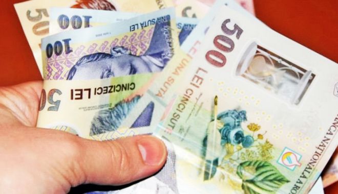 Leul pierde la euro și francul elvețian, dar mușcă din dolar - leul-1607015711.jpg