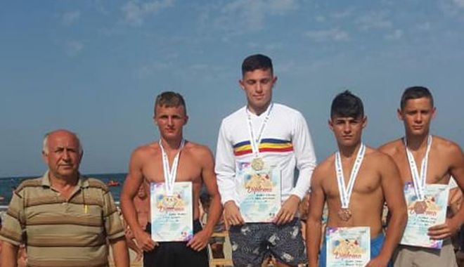Luptătorii constănțeni, la înălțime!  Medalii la Naționale, pe plaja din Mamaia - luptatorii-1535991029.jpg
