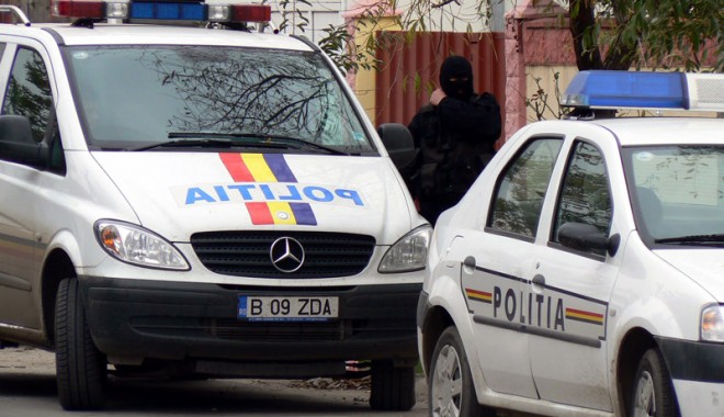 Poliția și Garda Financiară au descins la 