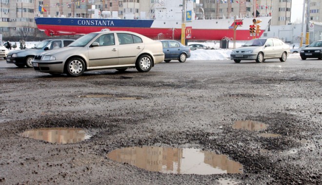 Vreți șosele de calitate?  Faceți reforma achizițiilor publice! - masinigropiasfaltintersectieaure-1330267422.jpg
