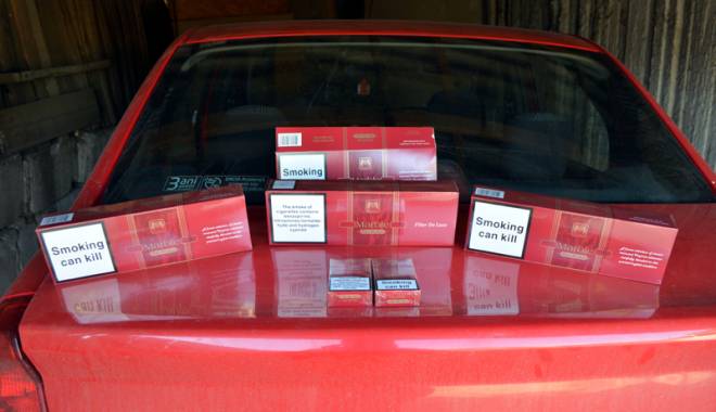 Descinderi în forță la Constanța: limuzine, zeci de mii de euro și țigări de contrabandă confiscate - masinizecidemiideeuro-1438018696.jpg