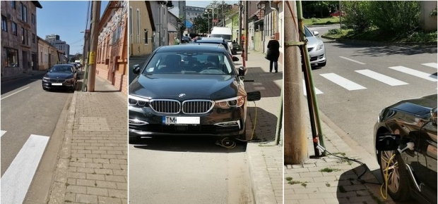 IMAGINEA ZILEI. Un șofer și-a pus BMW-ul Hybrid la încărcat, direct la stâlpul stradal de electricitate - media165209189579109600-1652094530.jpg