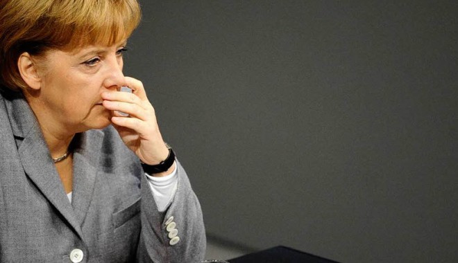 Până trece criza euro, nemții își țin respirația - merkel-1352041676.jpg