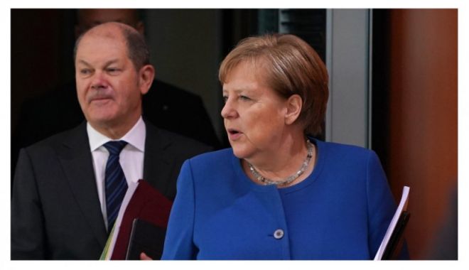 Scholz o apără pe Merkel în fața criticilor aduse încercărilor sale de reconciliere cu Rusia