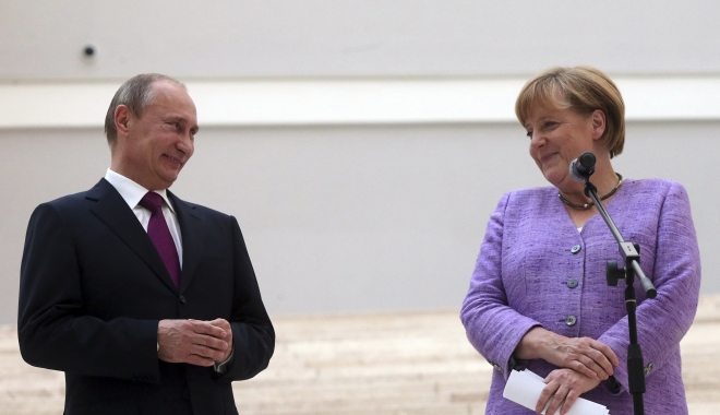 Merkel vrea să discute cu Rusia problema atacurilor informatice și a știrilor false - merkelputin-1487419435.jpg