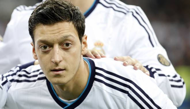 Mesut Ozil a ajuns la un acord cu tatăl său care îi cerea despăgubiri de 630.000 de euro - mesutozilfootball-1415781528.jpg