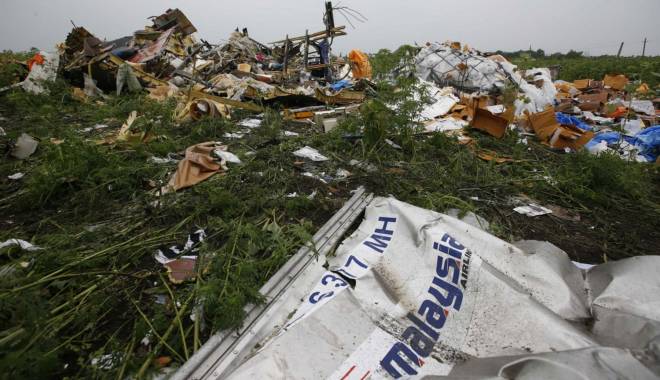 Zborul MH17: Anchetatorii au găsit fragmente ale unei rachete Buk la locul prăbușirii avionului malaysian - mh17-1439305248.jpg