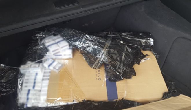Mii de pachete de țigări de contrabandă, ascunse într-un autovehicul - miidepachete-1533052855.jpg