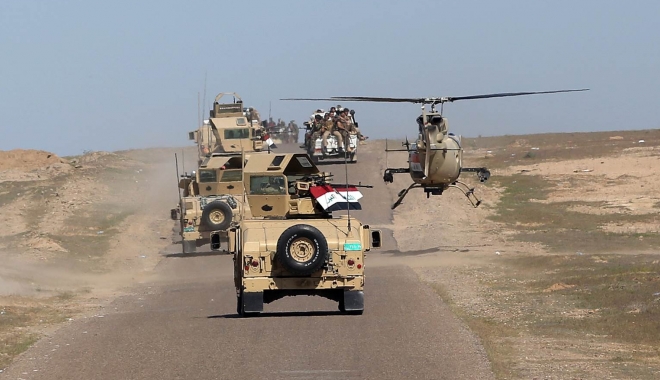 VIDEO EMOȚIONANT. Copil salvat de la moarte de un militar american - mosul00392400-1497952958.jpg