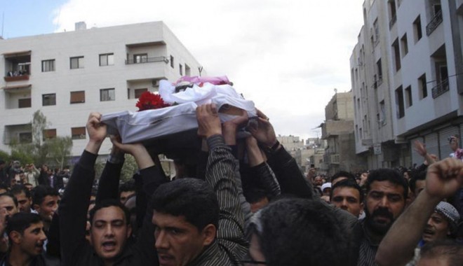 Masacru în timpul violențelor de duminică în Siria - oameniucisisiria-1333374629.jpg