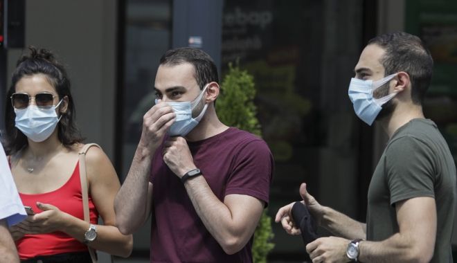 OMS le cere persoanelor vaccinate să poarte în continuare masca de protecție - omsmasca-1625576862.jpg