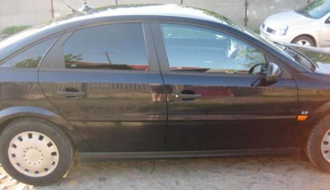 Au vrut să scoată mașini din țară cu acte false - opel-1396435317.jpg