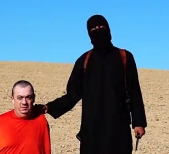 Statul Islamic ucide din nou! Un lucrător umanitar ar fi fost decapitat - ostaticbritanicstatulislamic-1412404913.jpg