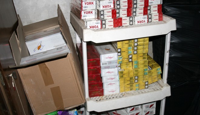 Galerie FOTO și VIDEO. Percheziții de amploare la Constanța / Mașini, alcool și țigări, confiscate de polițiști - p4-1378884149.jpg