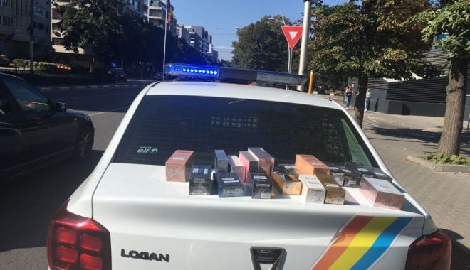 Parfumuri posibil contrafăcute, vândute la „superofertă”, pe stradă, în Constanţa - parfumuri-1631185832.jpg