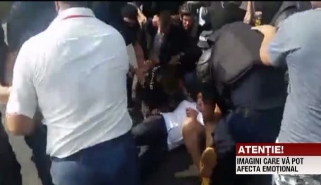 Parlamentar român, pus la pământ de mascați, în Chișinău - parlamentar31321000-1535881777.jpg
