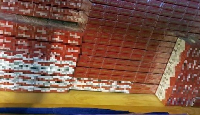 Percheziții domiciliare într-un dosar de contrabandă cu țigări. Un bărbat a fost reținut - perchezitii-1592490279.jpg